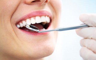 پر کردن دندان در مرکز دندانپزشکی غرب