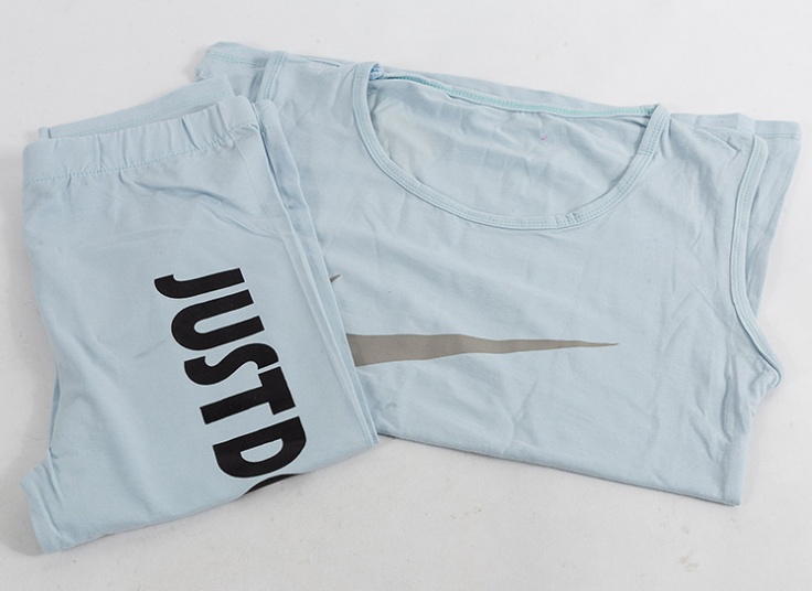 ست تاپ و شلوارک زنانه طرح Nike