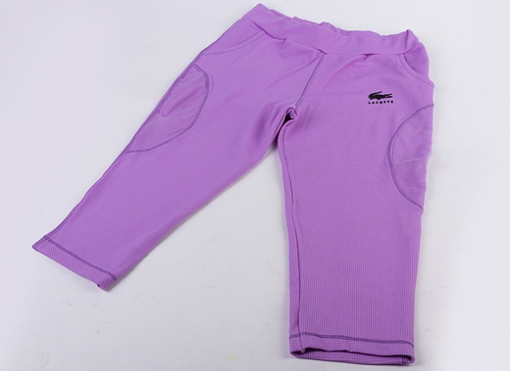 ست تاپ و شلوار برمودا زنانه Lacoste