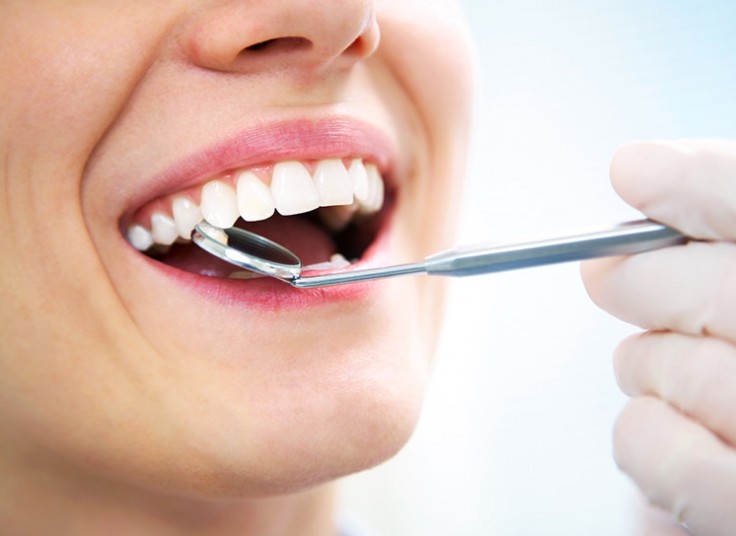 پر کردن دندان در مرکز دندانپزشکی غرب