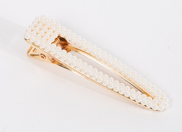 گیره مو و دستبند مرواریدی