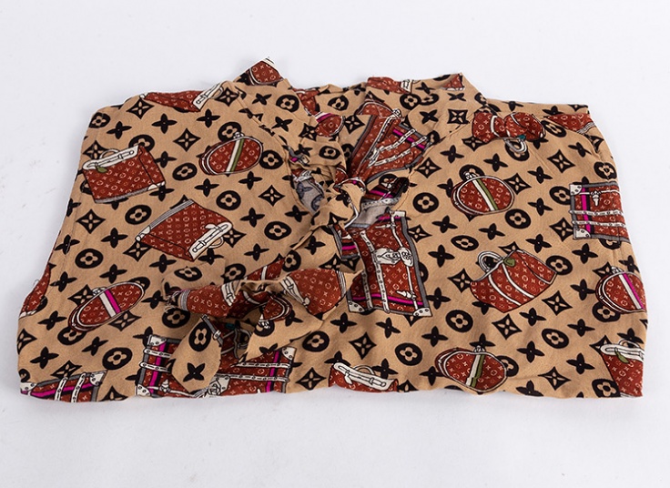 تاپ یقه گره‌ای نخی طرحدار