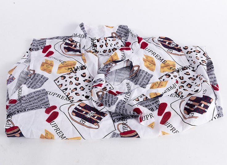 تاپ یقه گره‌ای نخی طرحدار