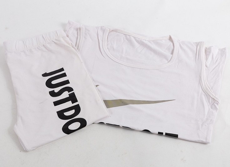 ست تاپ و شلوارک زنانه طرح Nike