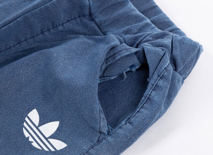 شلوار اسلش مردانه‌ طرح adidas