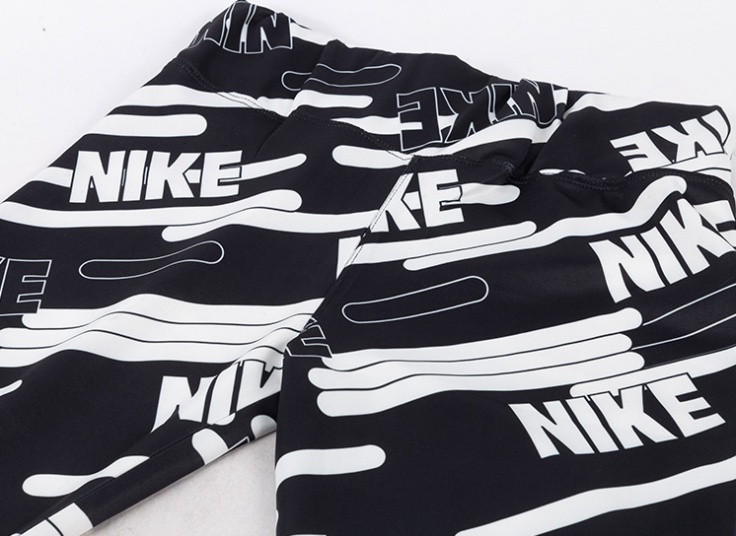 ست نیم تنه و شلوار زنانه طرح NIKE