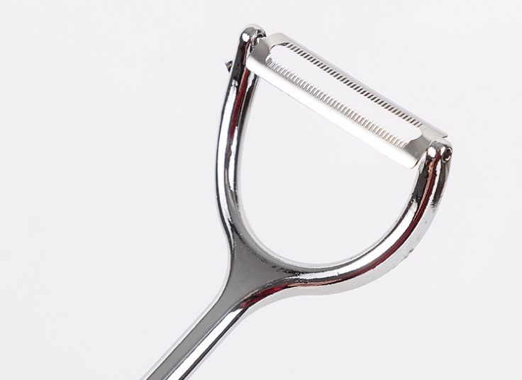 پوست کن کمانی